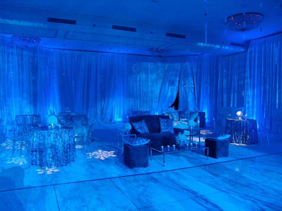 dramatic-pipe-and-drape-with-intimate-lounge-decor-and-lighting