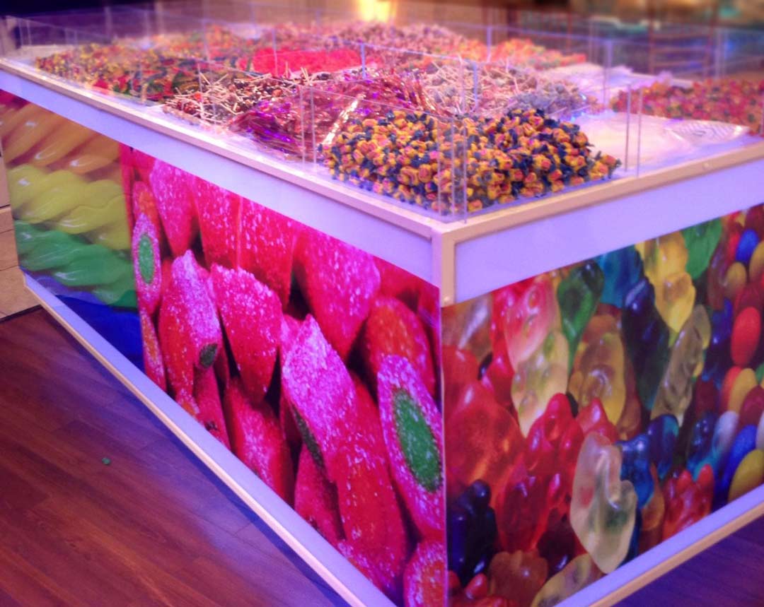 giant-candy-bar-decorated-with-posters-of-candy-and-filled-with-various-candies